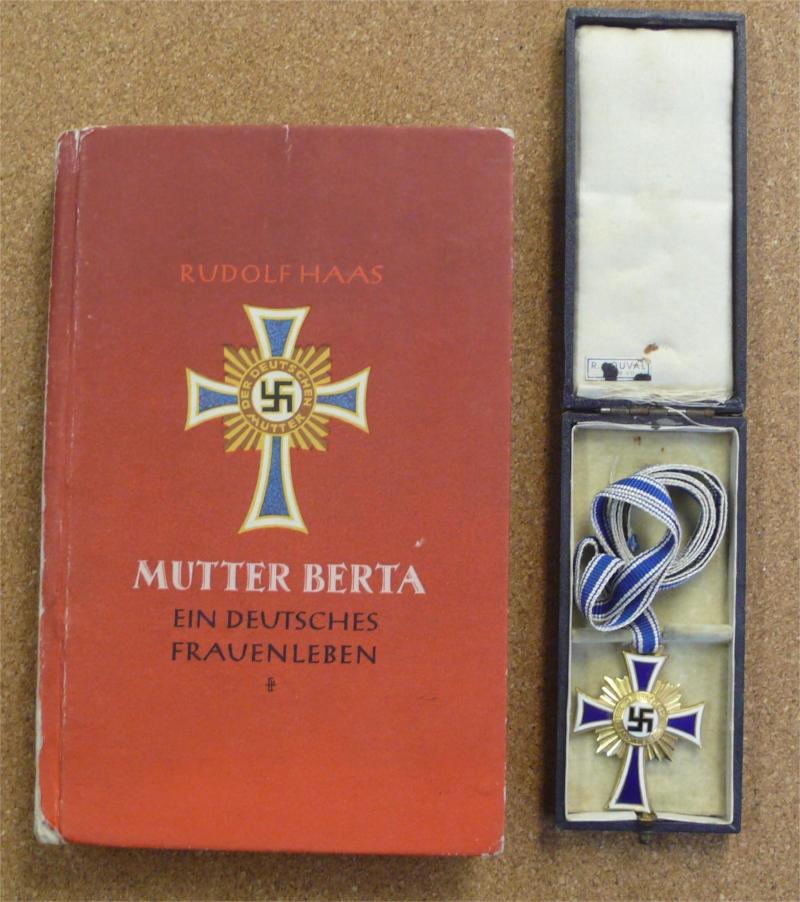 CASED MOTHERS CROSS IN GOLD AND INTERESTING BOOK